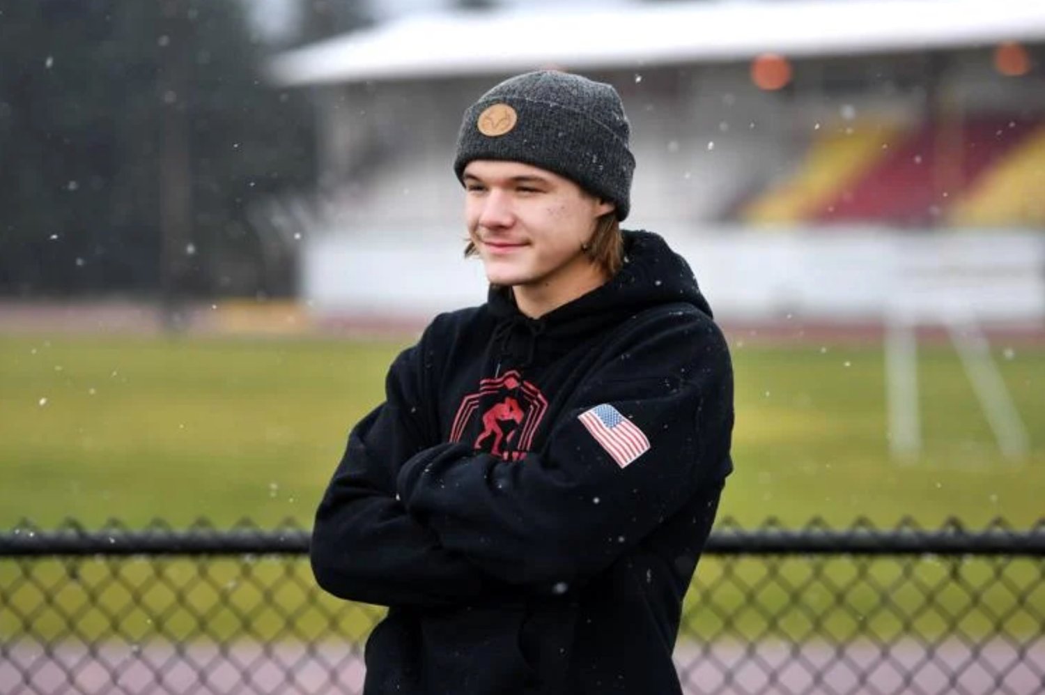 Winlock senior football player and wrestler Jay Crow poses in front of Winlock High School's football field on Tuesday, Dec. 1.